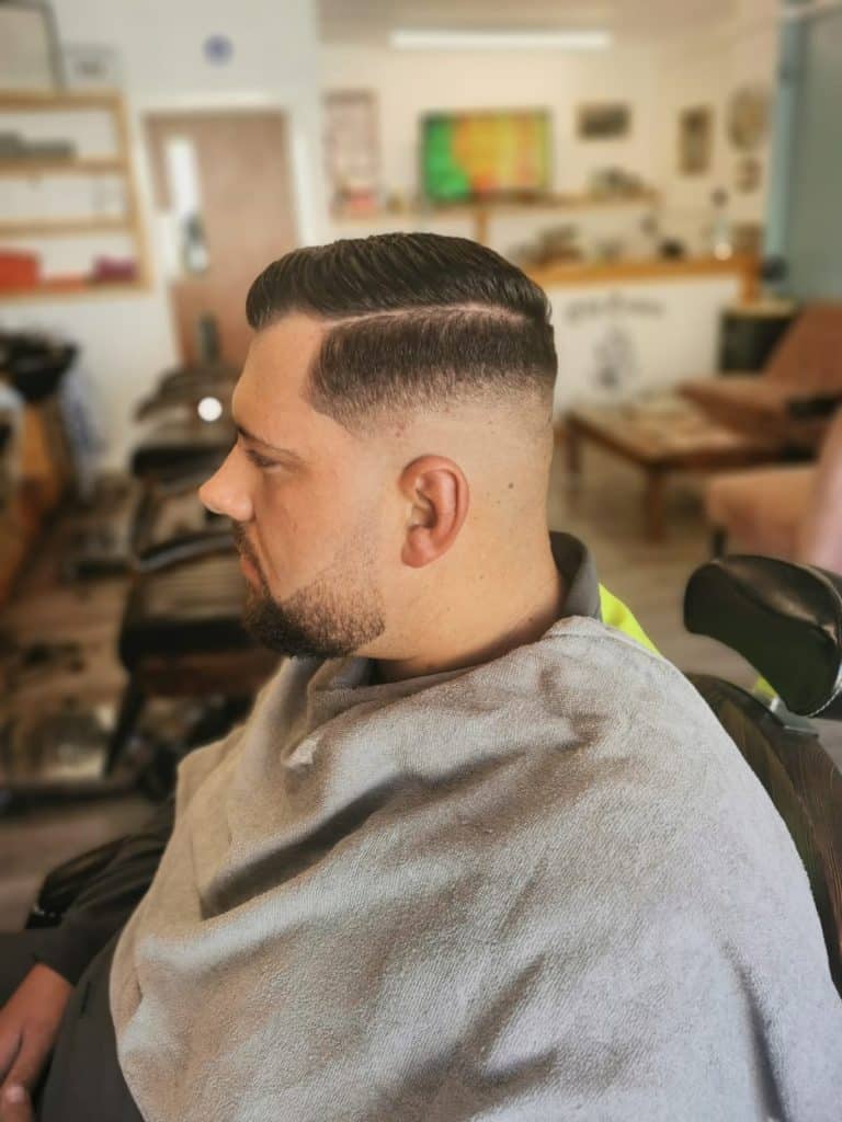 Men’s skin fade haircut, side profile