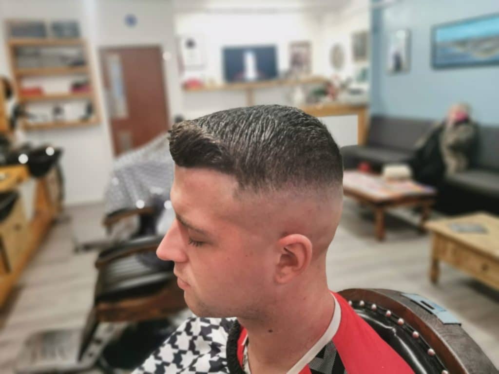 Back view of a clean skin fade haircut