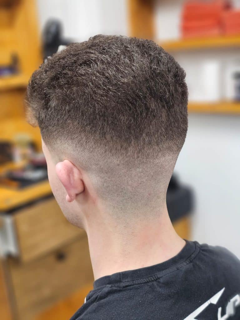 Skin fade with a razor-sharp line-up