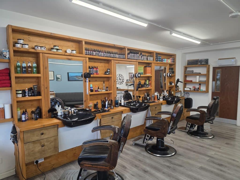 Barber chairs and mirrors inside Old Town Barbers